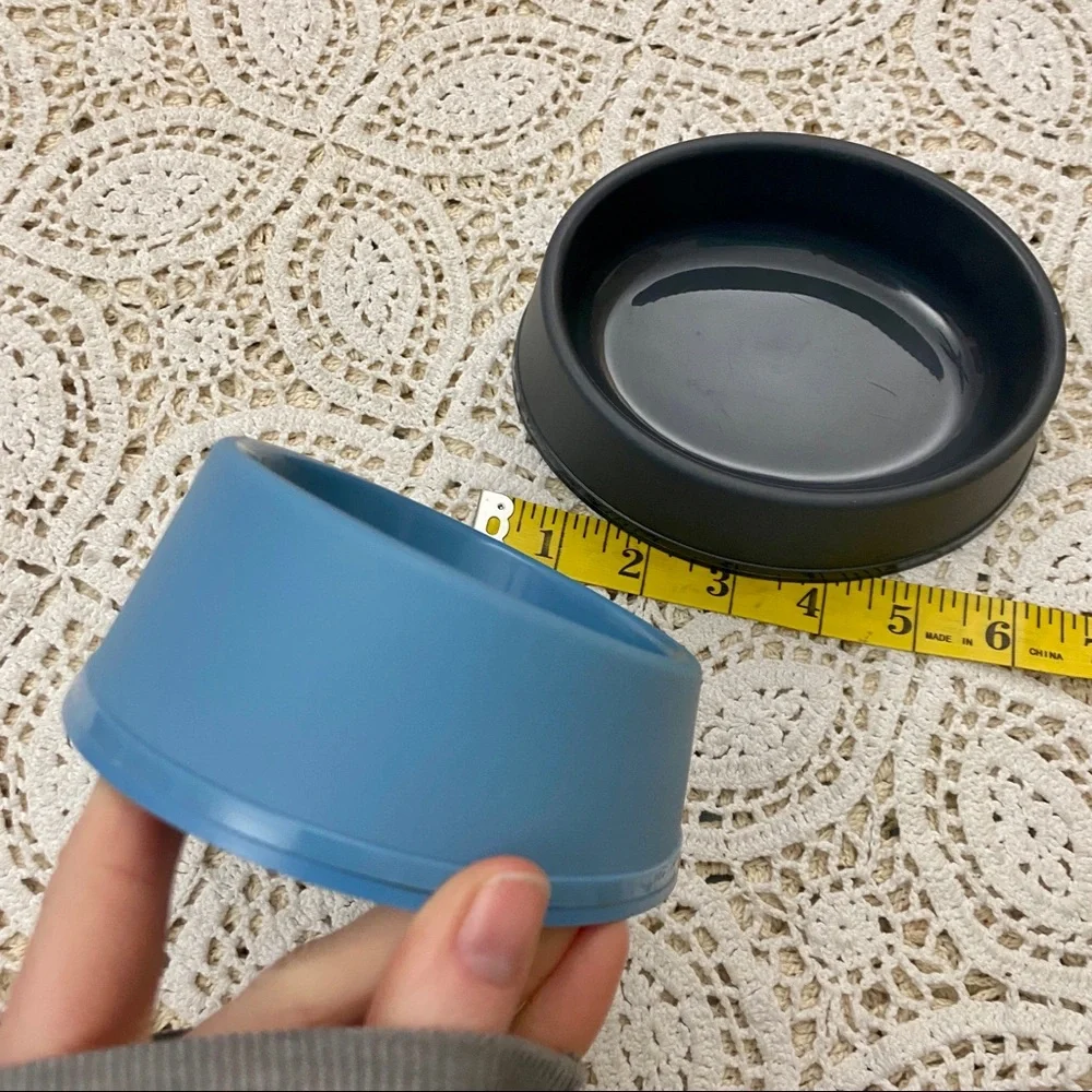 Two pet food + water bowls